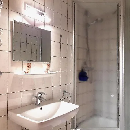 Отель Hotel Zum Postkutscher Котбус